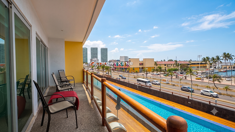 Deck12, Premium de 2 cuartos, acceso a la piscina, estaciona
