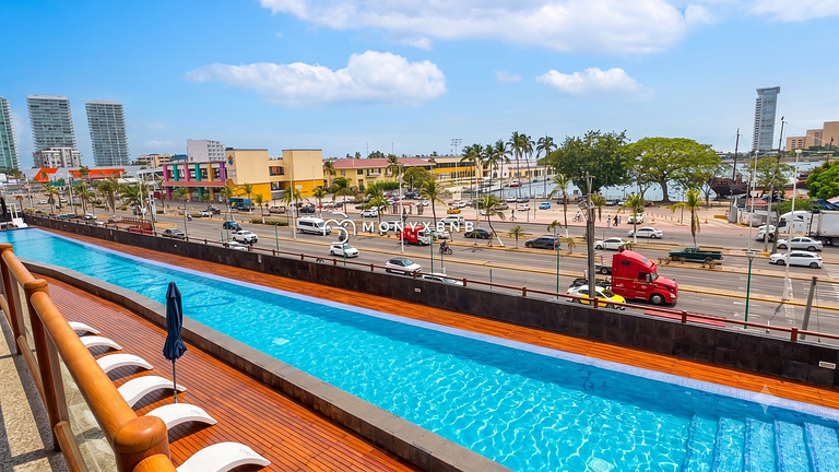 Deck12, Premium de 2 cuartos, acceso a la piscina, estaciona